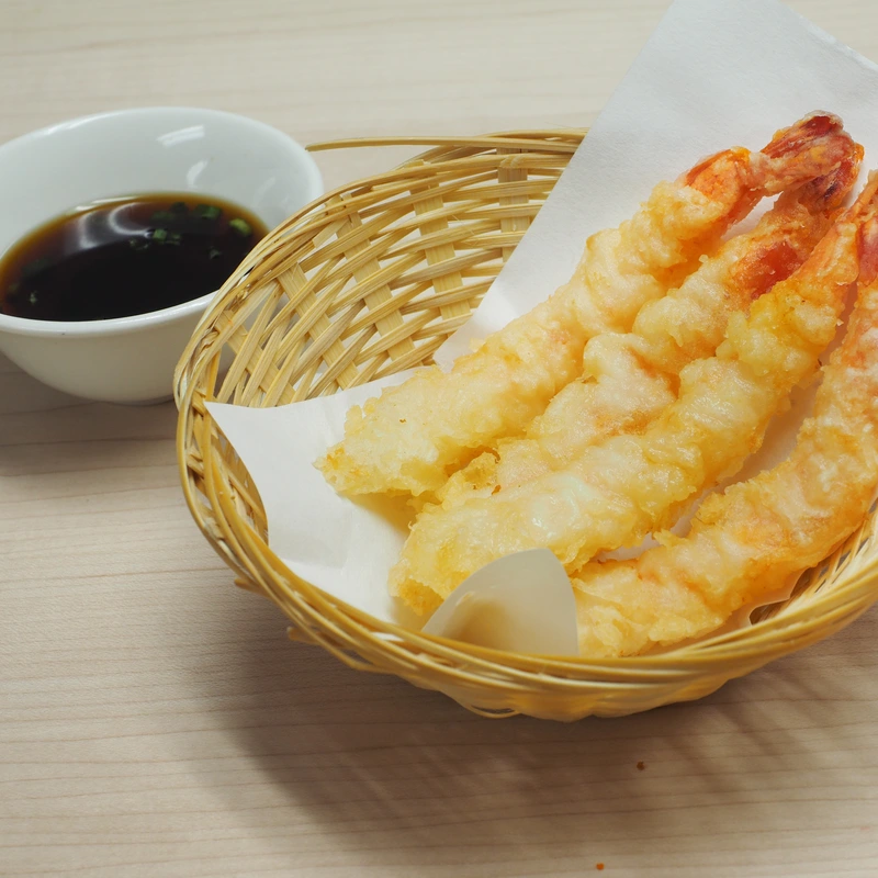 Kinjo tempura in a paper-lined basket